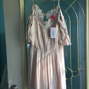 Cream colored romper, Chelsea and Violet brand L